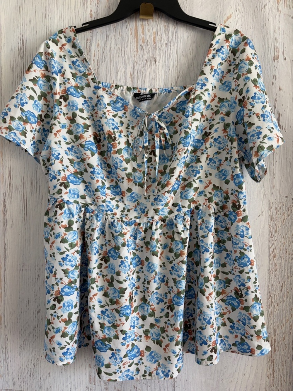 BloomChic White Floral Peplum Top with Blue Roses